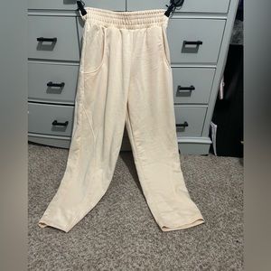 Cream sweat pants/leggings.
